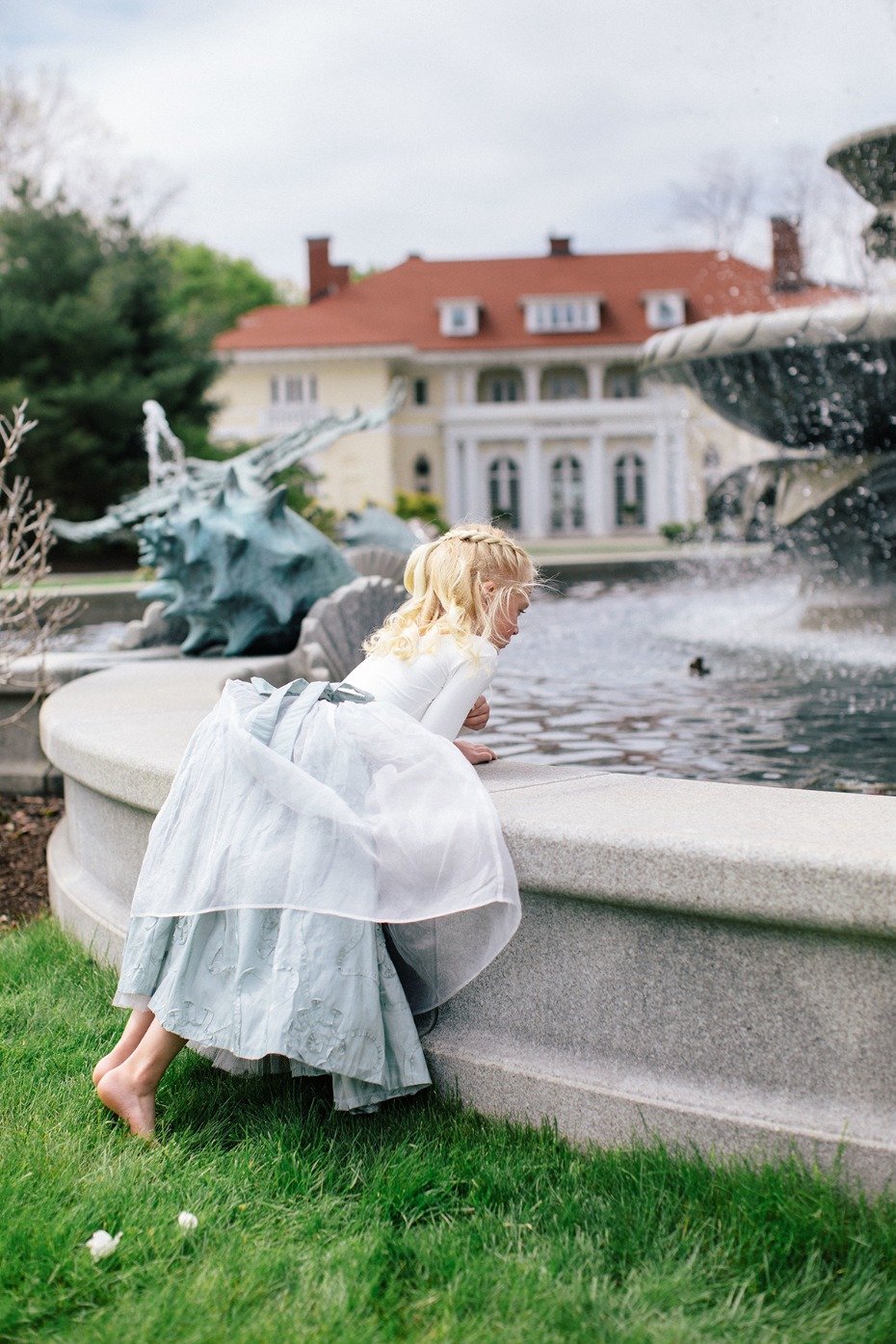 flower girl and a fountain