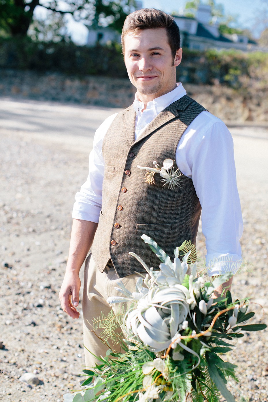 groom in tweed vest and white button down