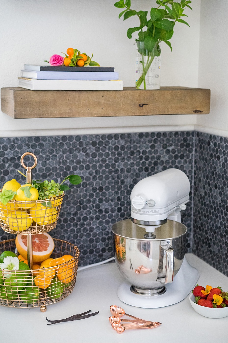 Kitchen with fruit, stand mixer and ingredients for baking