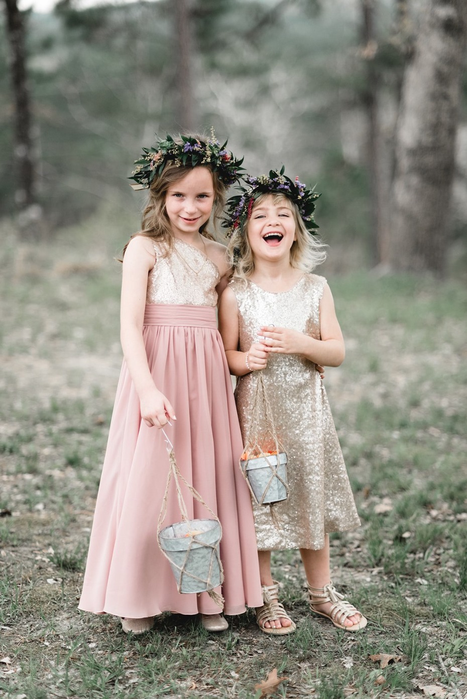 Cute flower girls in sparkly dresses