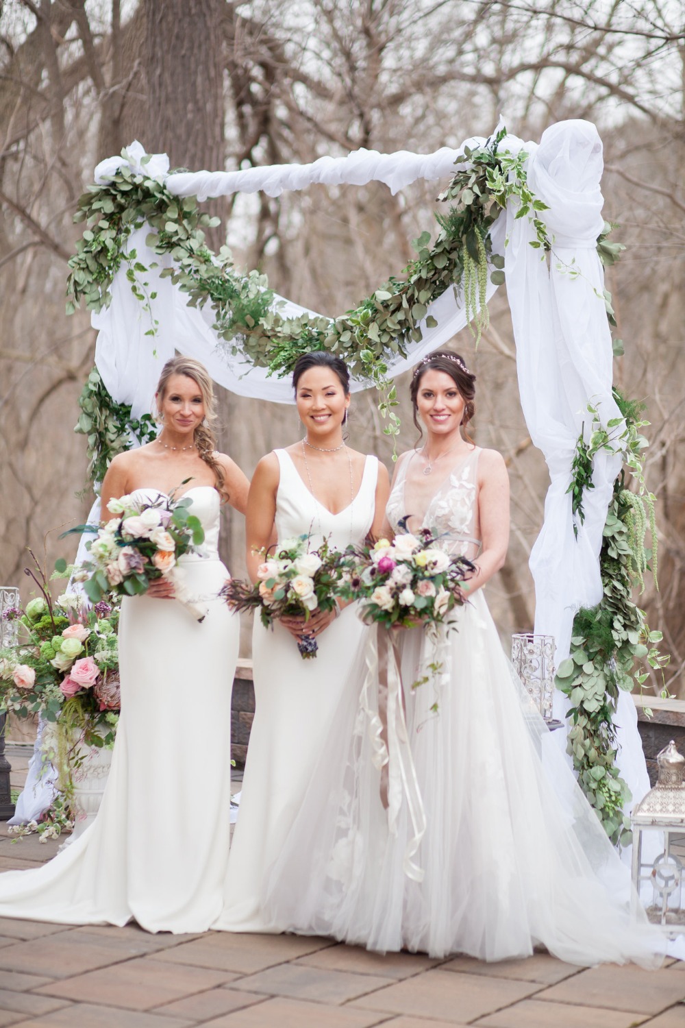 bride and bridesmaids in shades of white