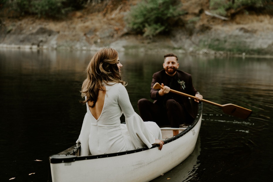Bride and groom in a canoe