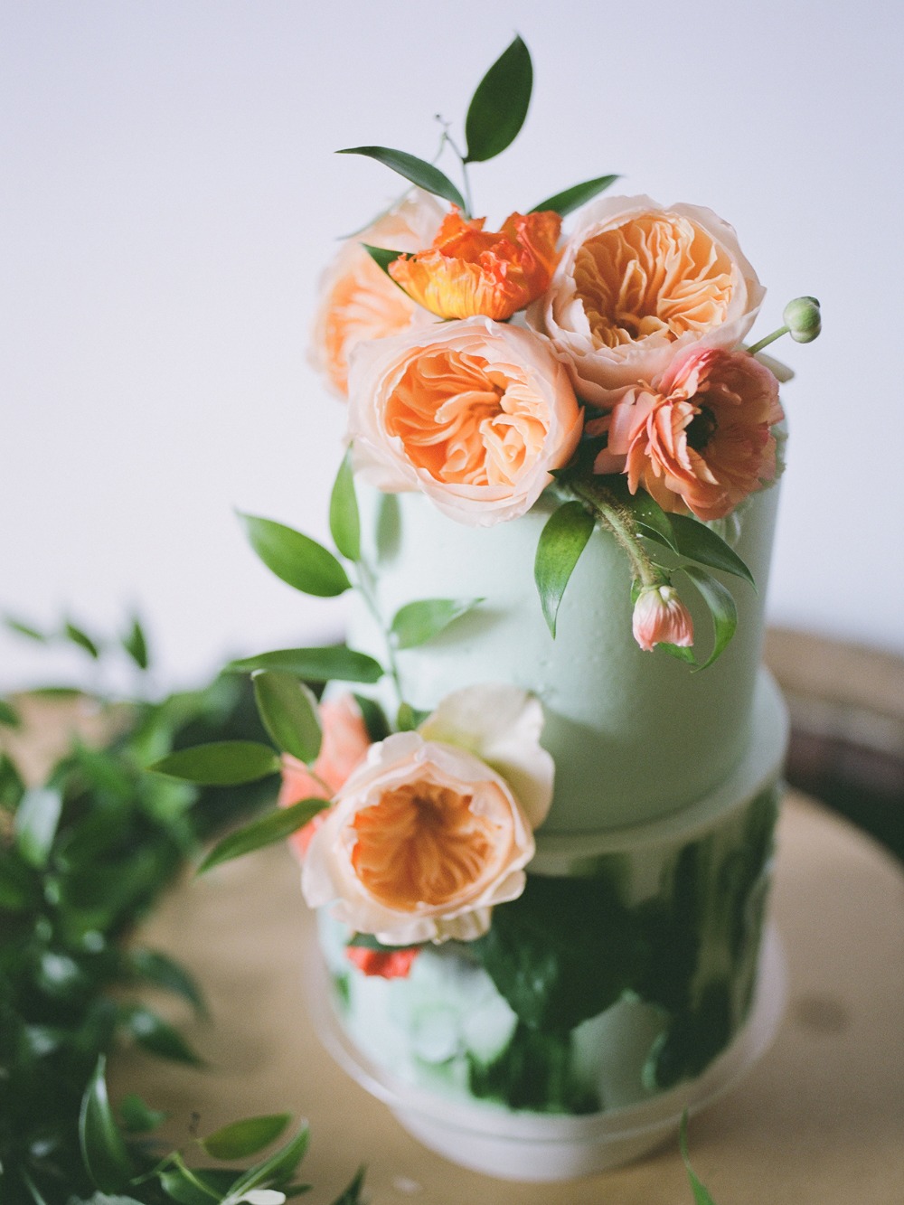 mint and peach wedding cake