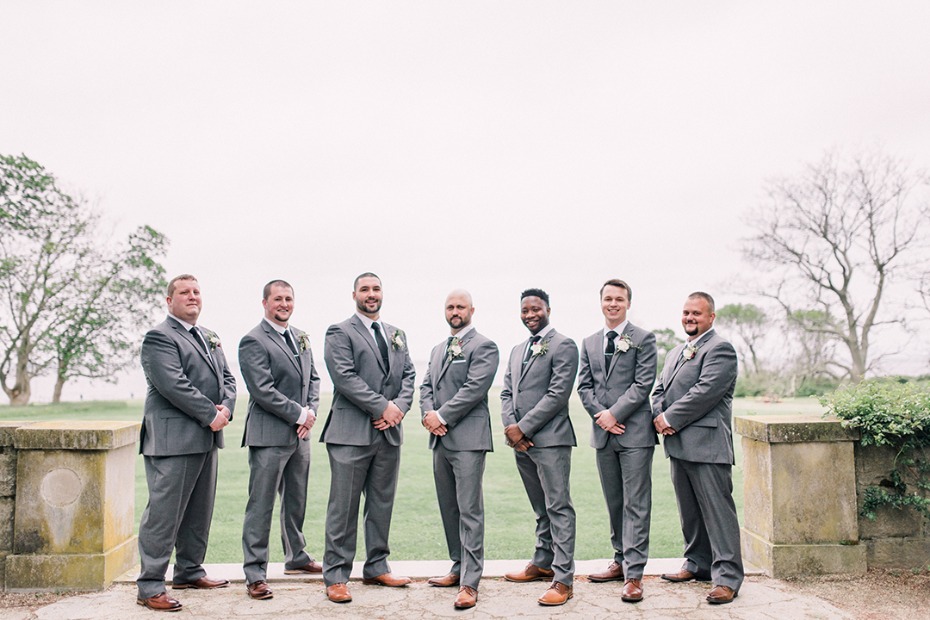 groom and his men in grey suits