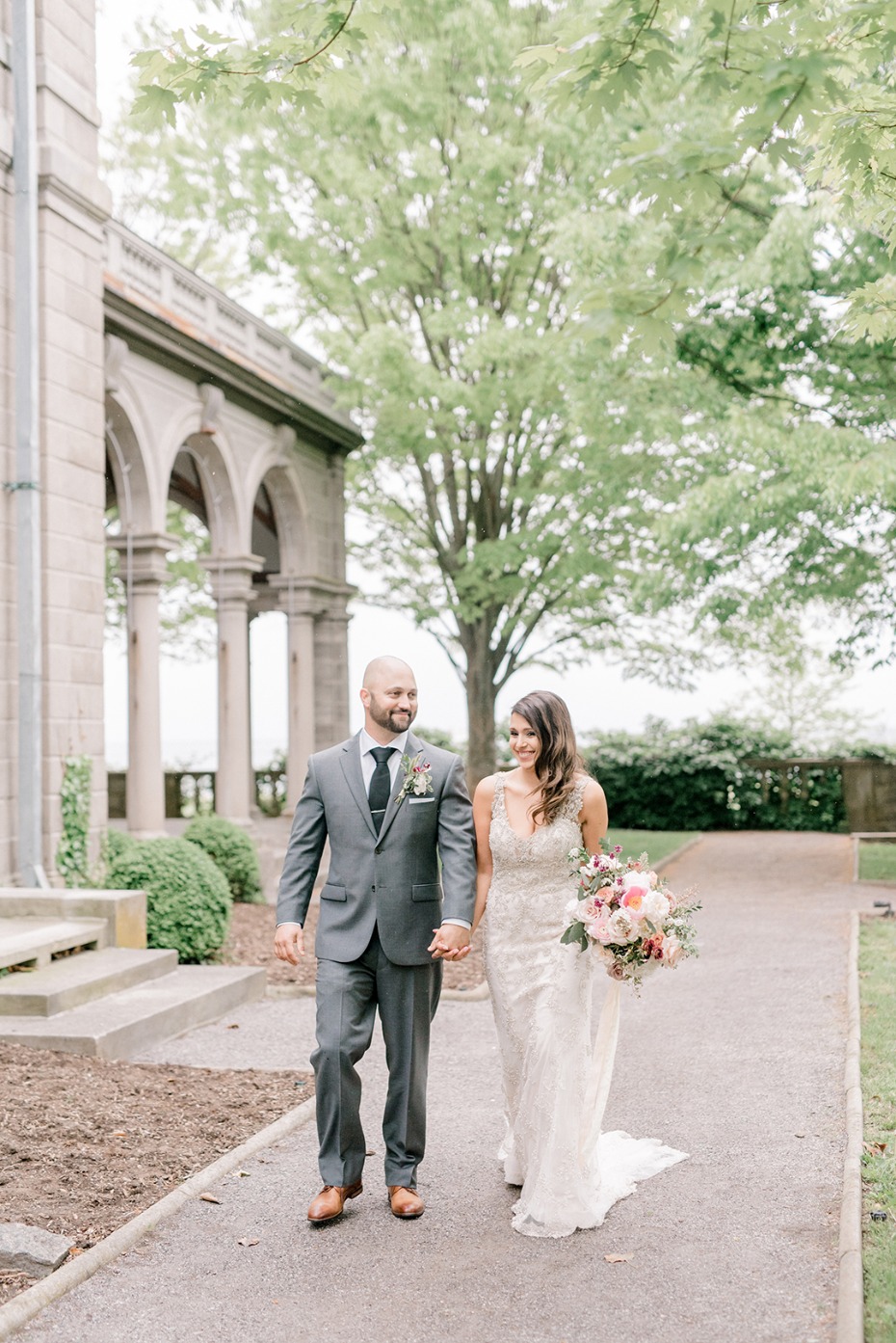 Happy couple walking together in a wedding after ceremony