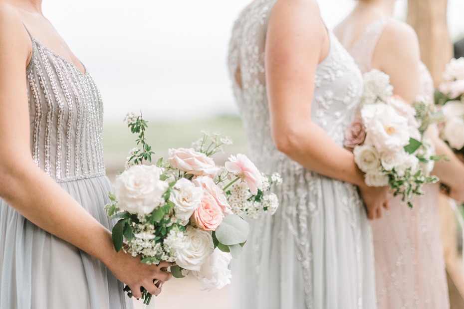 bridesmaids in soft grey with blush and white bouquets