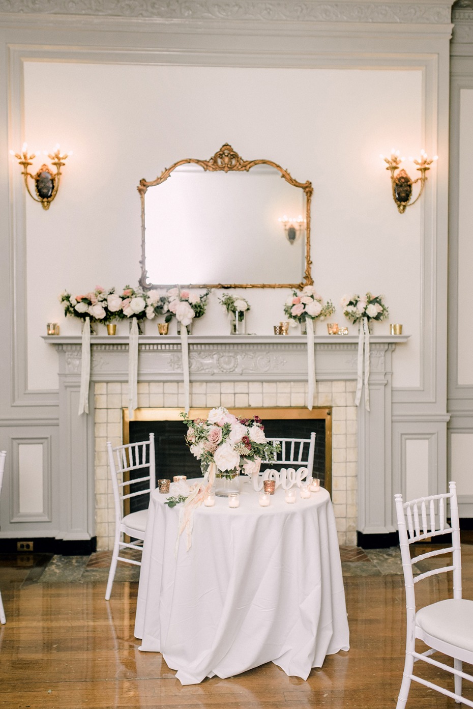 Elegant wedding reception decor with flowers and table setting