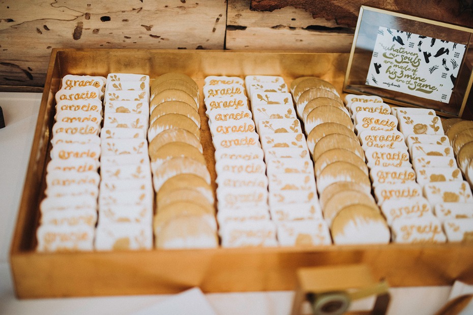 gold and white frosted wedding cookies
