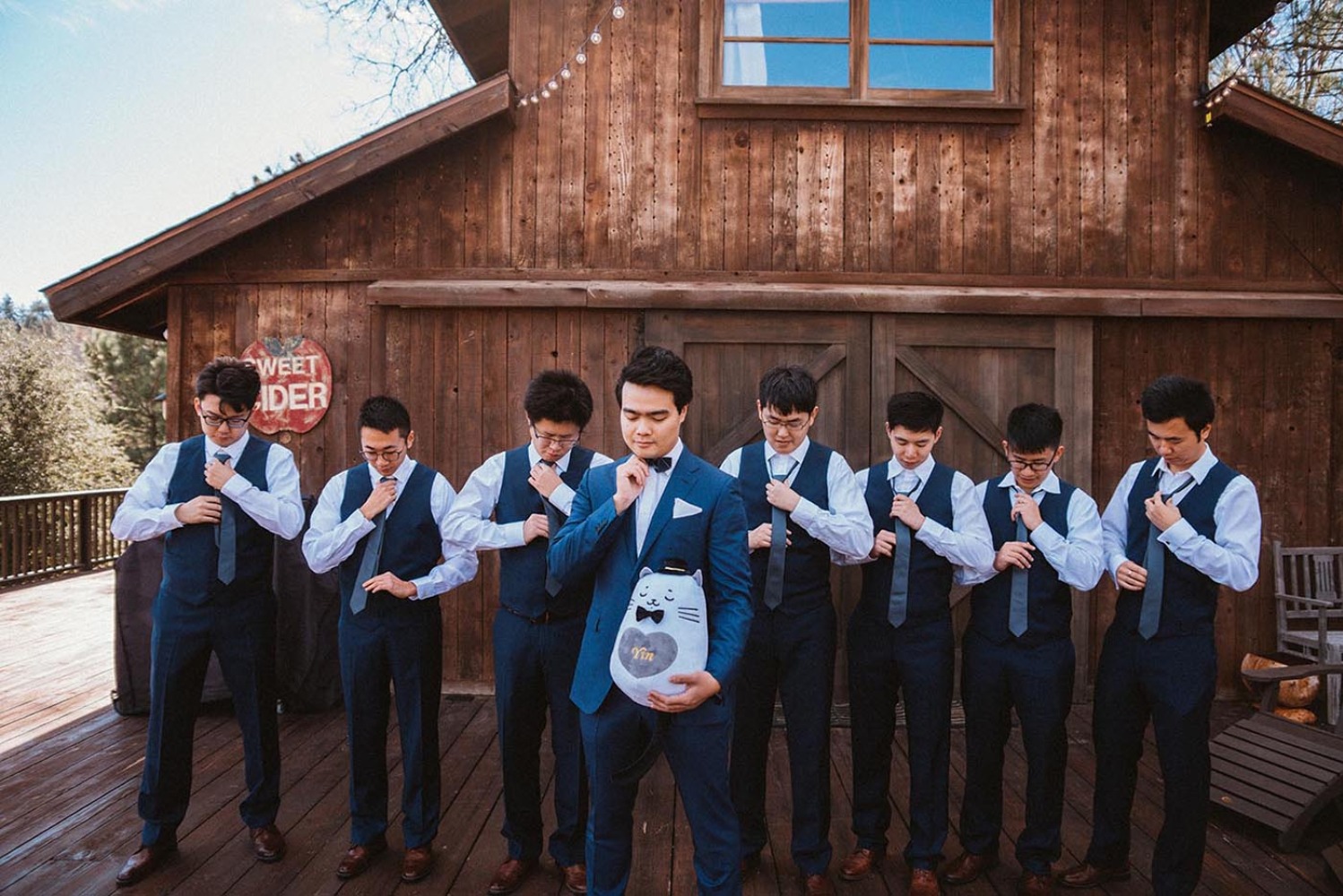 groom and his men in navy blue