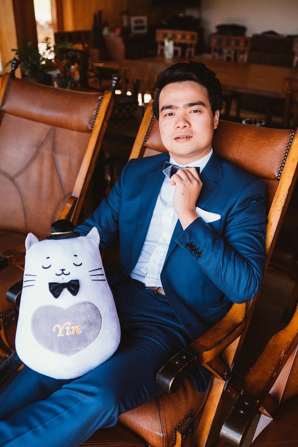 groom and cute cat plushie