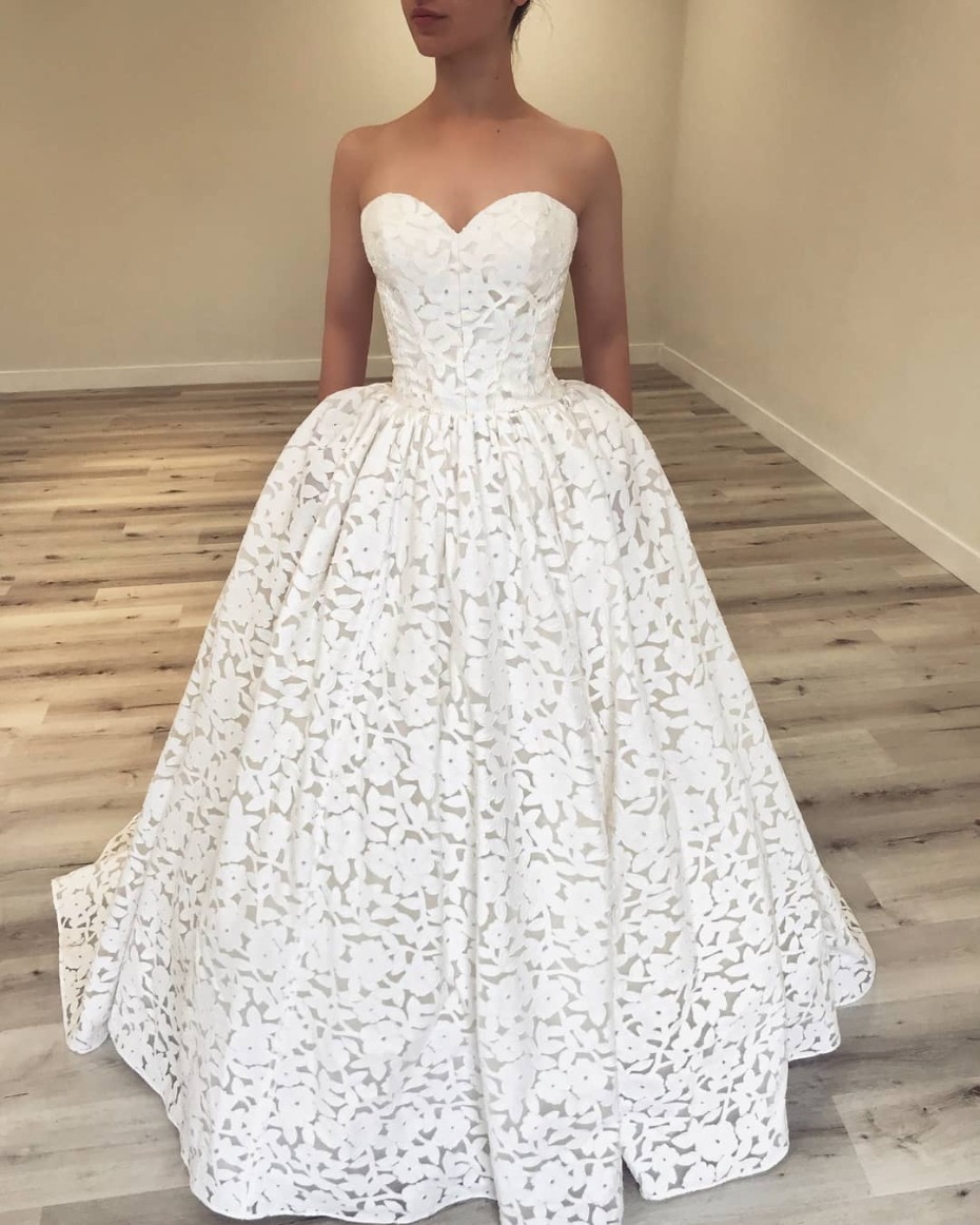 Stunning white lace ballgown wedding dress
