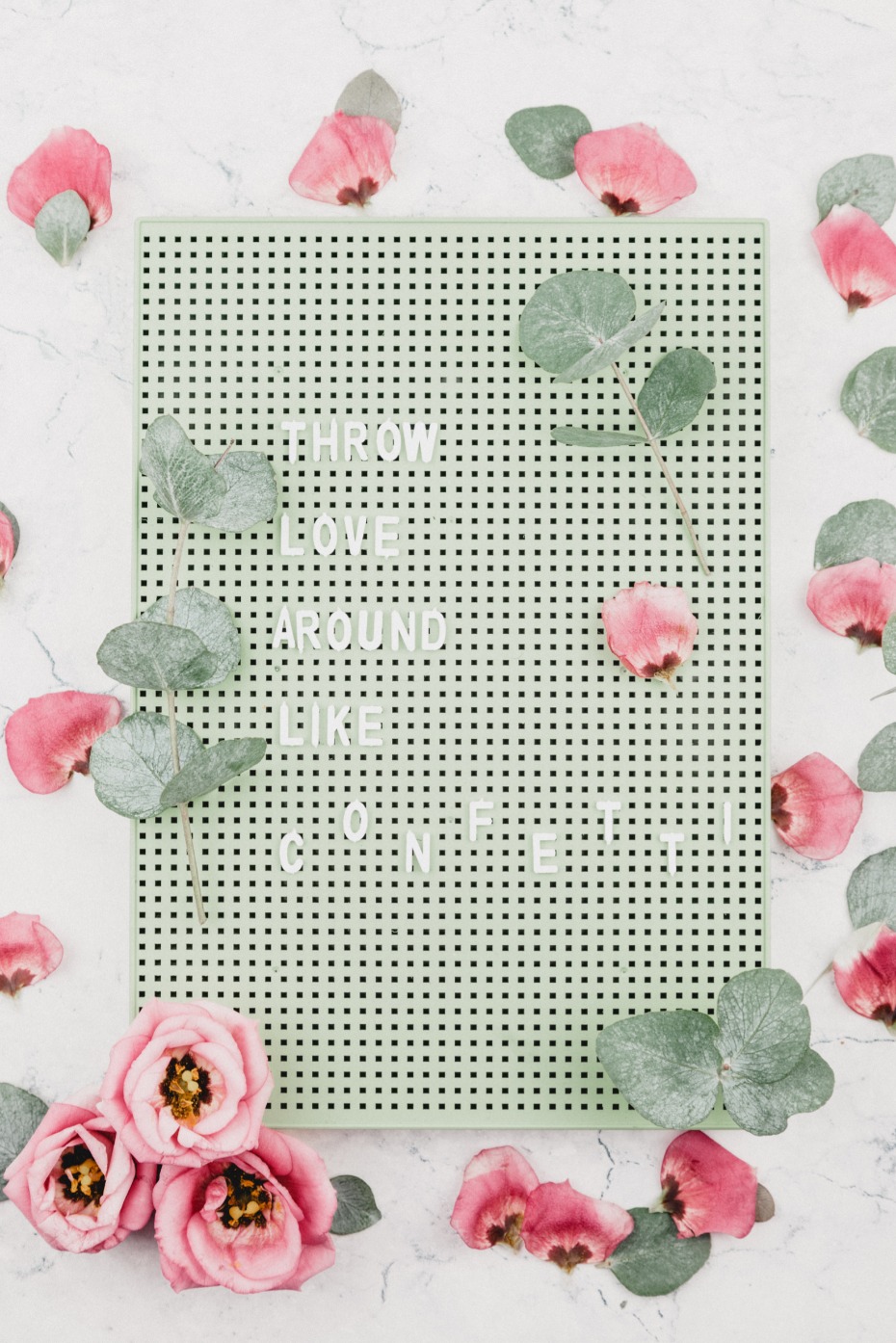 Floral message board saying Throw love around like confetti