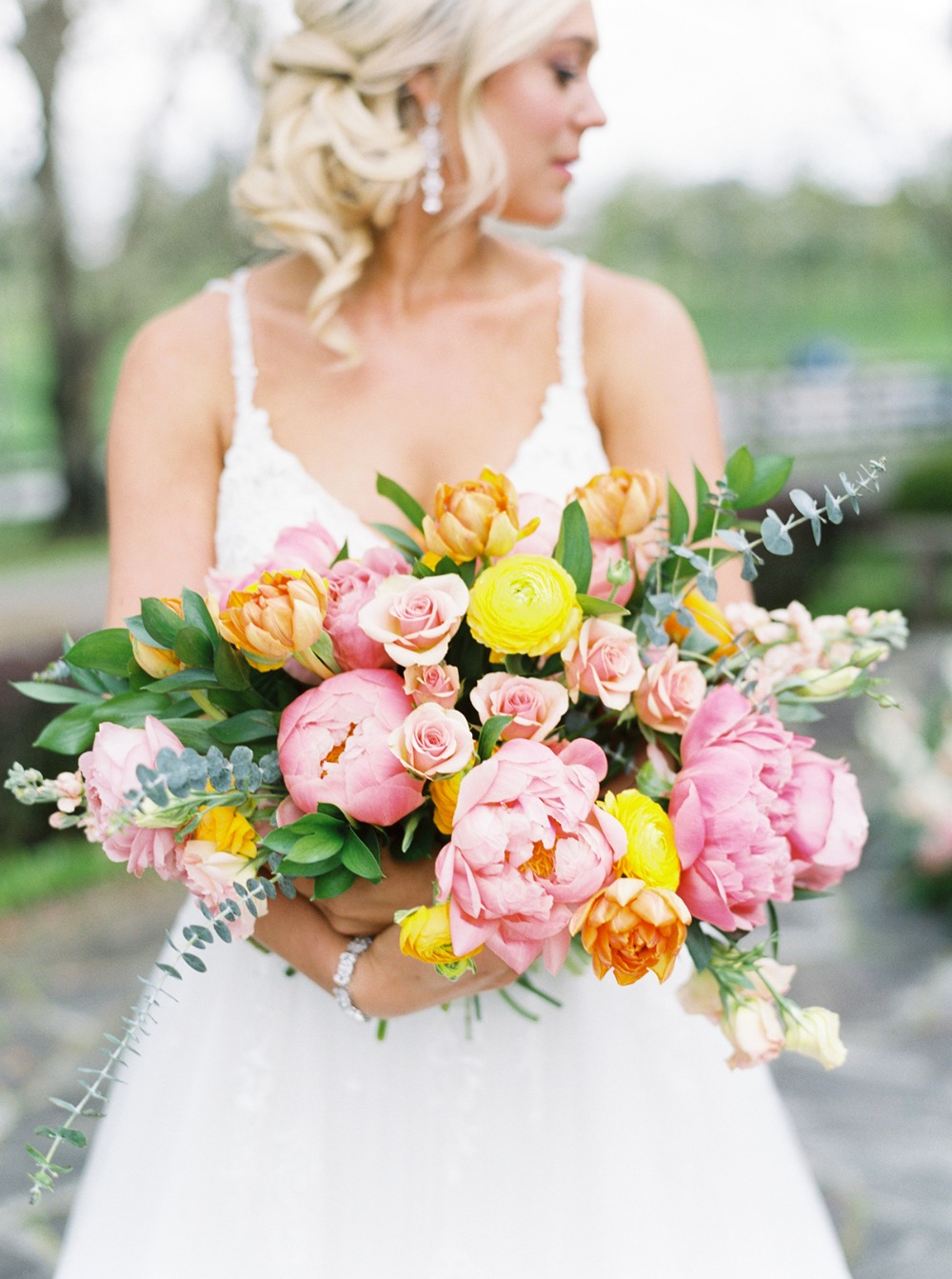 pink orange and yellow springtime wedding bouquet