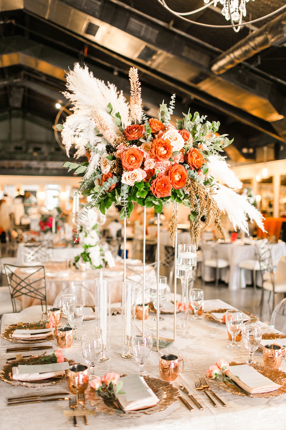 copper and gold wedding table idea with dramatic floating centerpiece