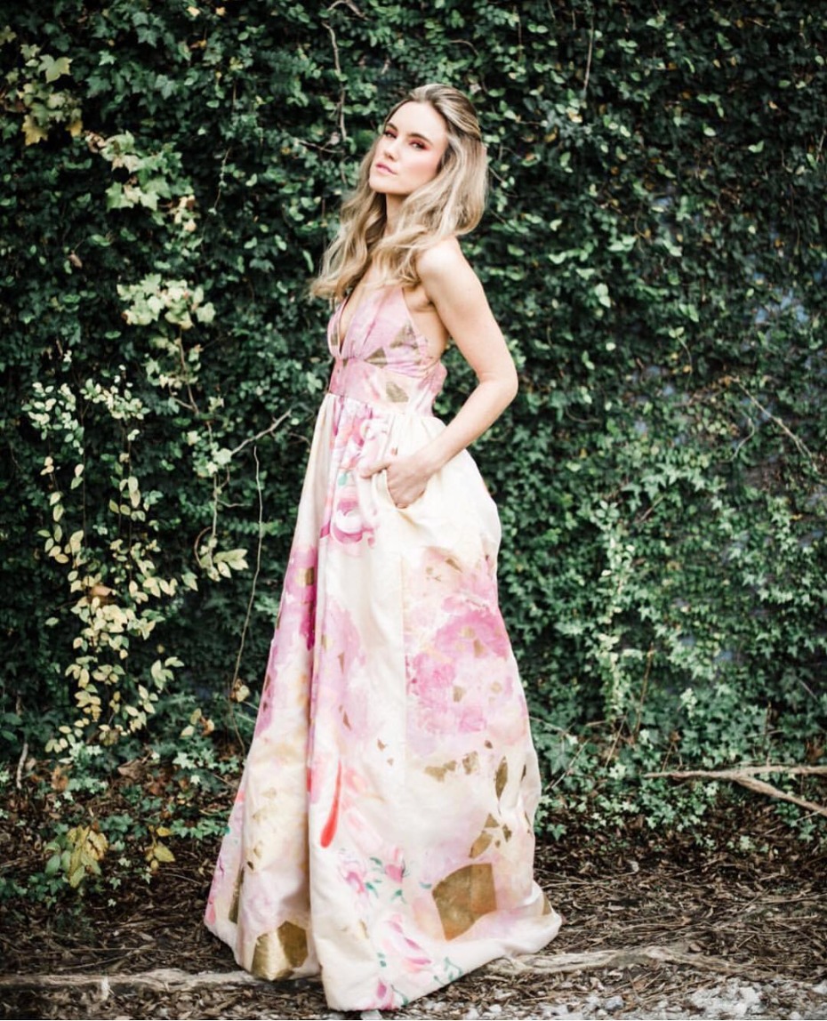 Elegant floral maxi dress, model posing outdoors