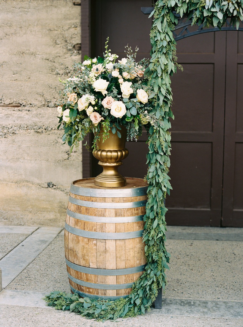Whiskey barrel wedding decor