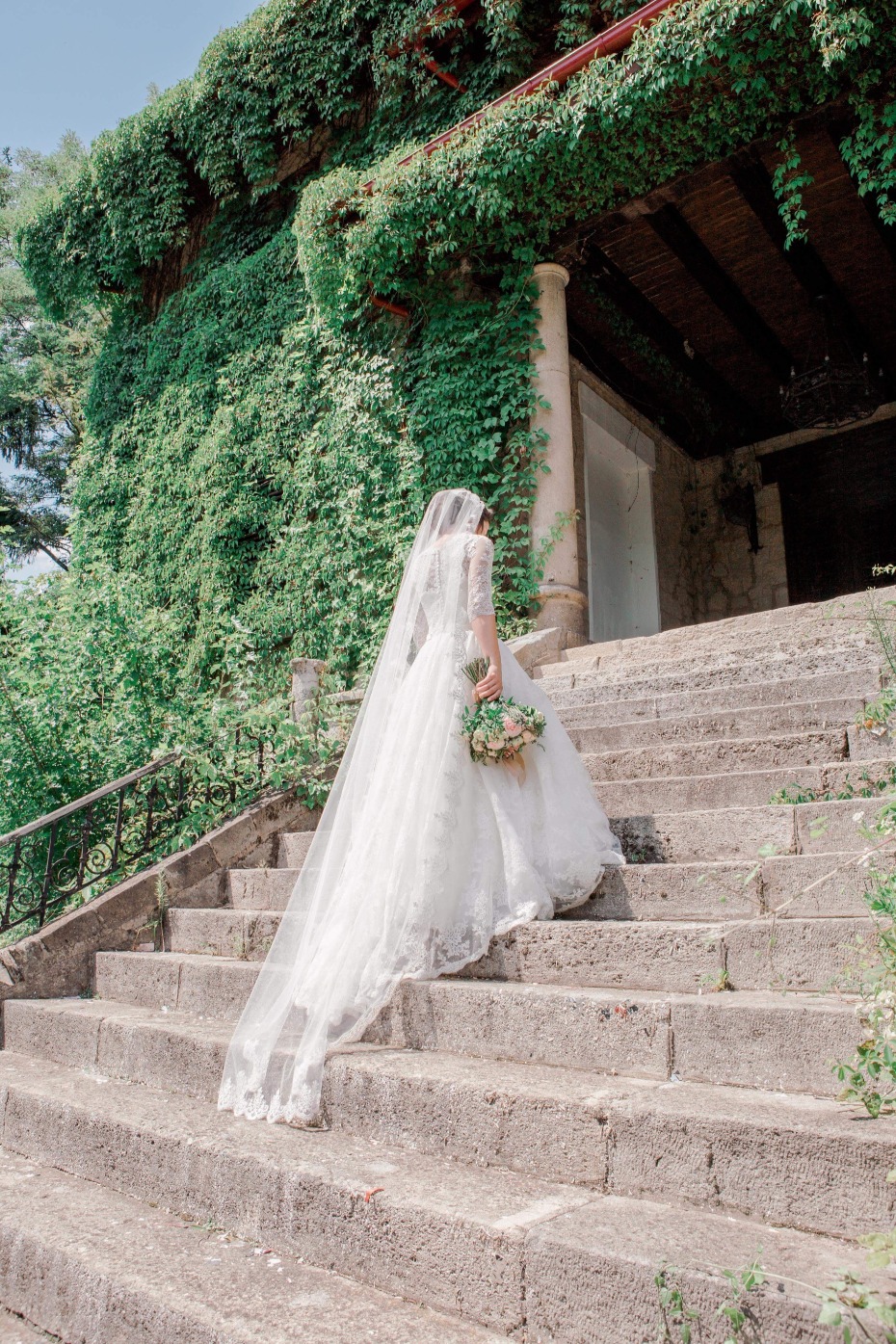 Bride ascending steps into ceremony