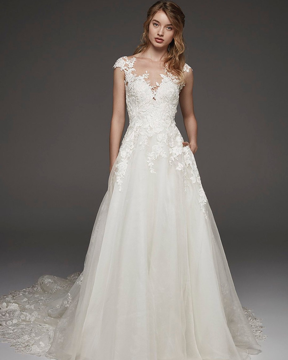 Elegant lace wedding gown with sheer bodice
