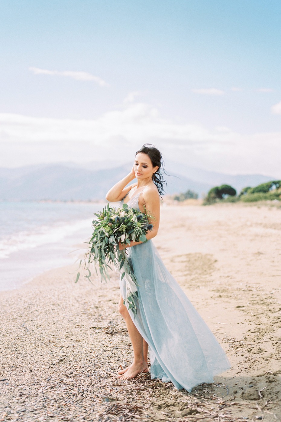 a bride at the beach