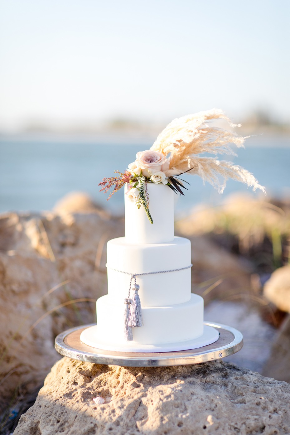 pampas grass topped wedding cake