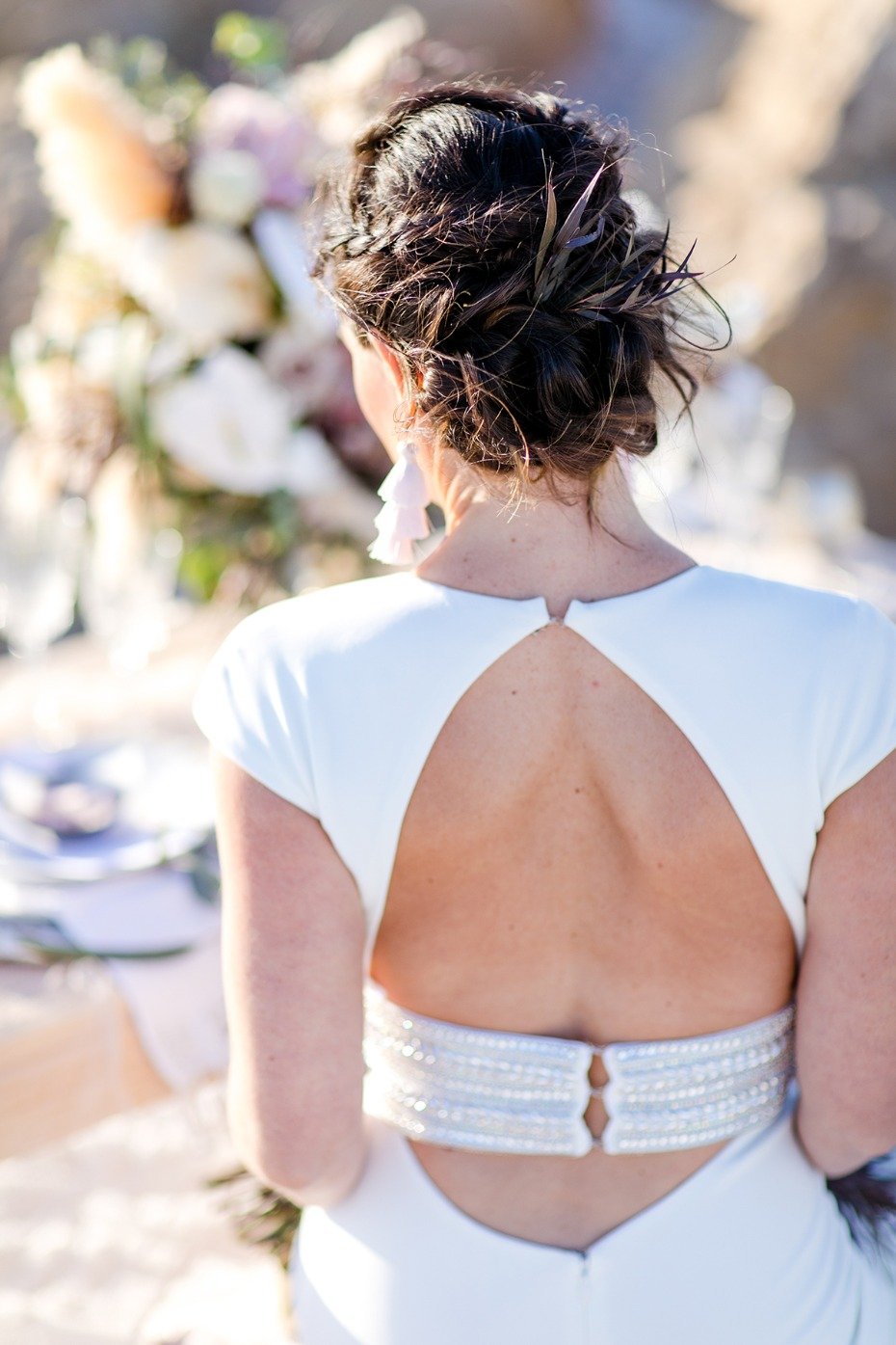 wedding updo and back showcasing dress