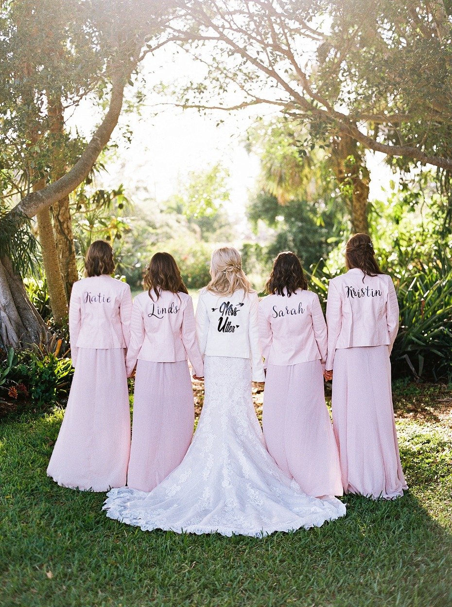 bride and her bridesmaids in leather jackets