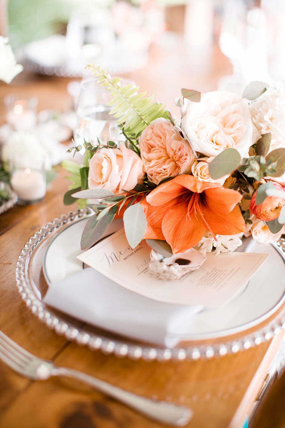 blush and orange wedding table setting