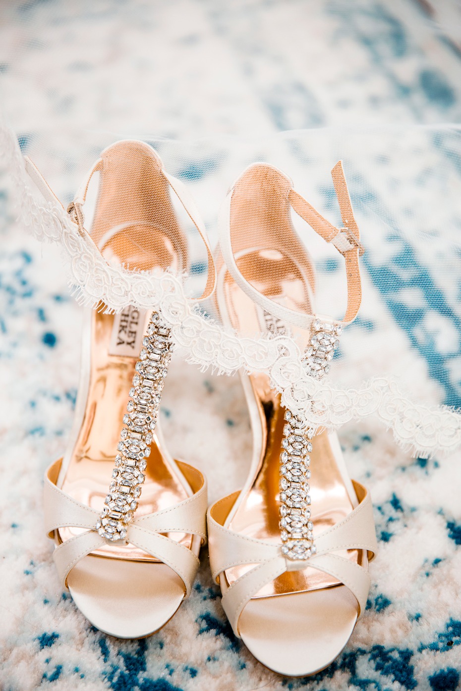 Elegant white wedding shoes with sparkling jeweled straps