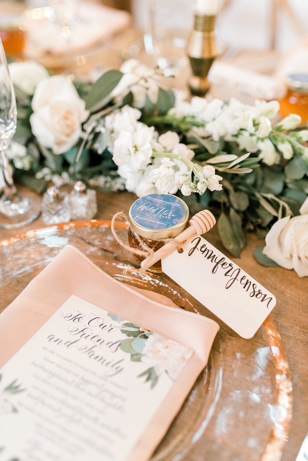 wedding place setting with a honey favor
