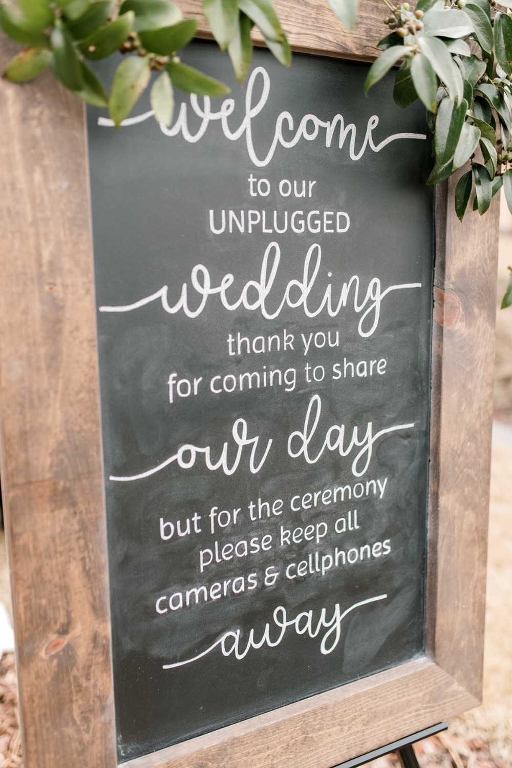 Unplugged wedding sign with a request to keep phones and cameras away
