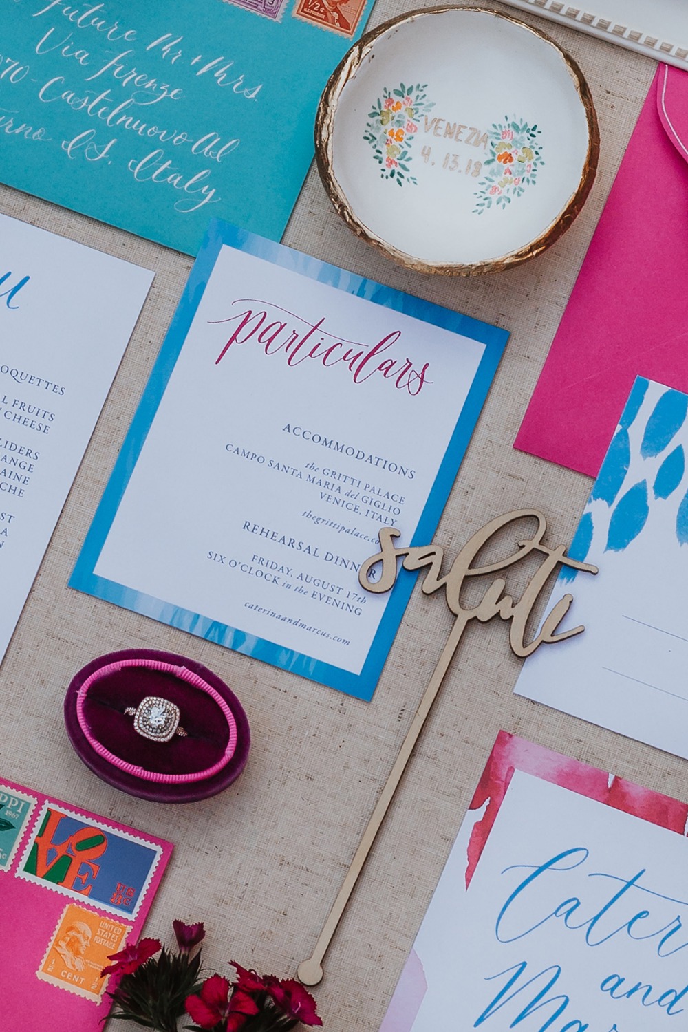 Elegant wedding details invitations and rings display