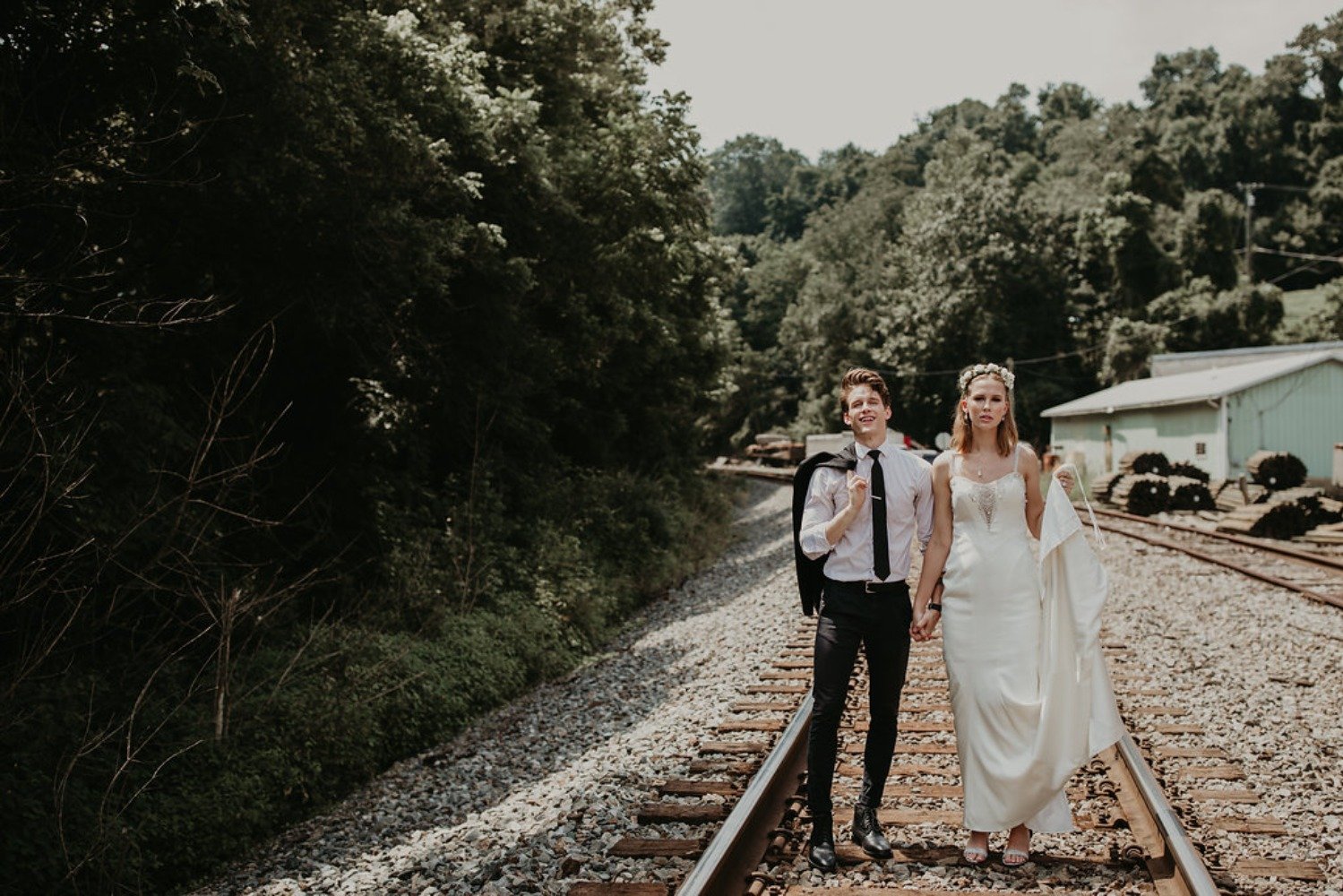 wedding couple on the train tracks