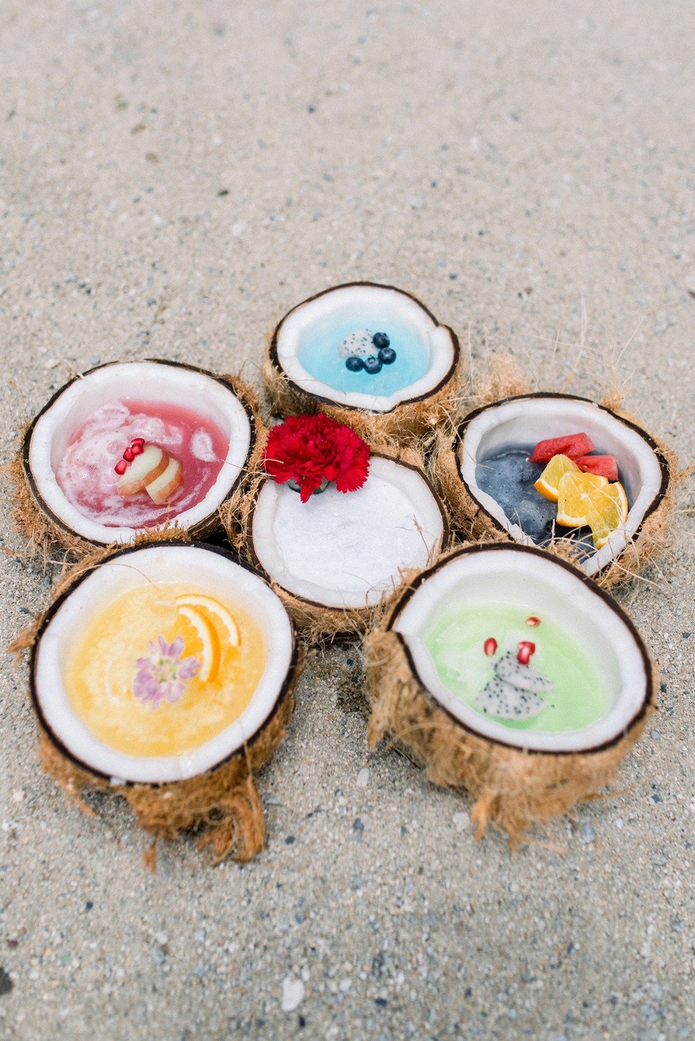 slushie cocktails in coconut shells