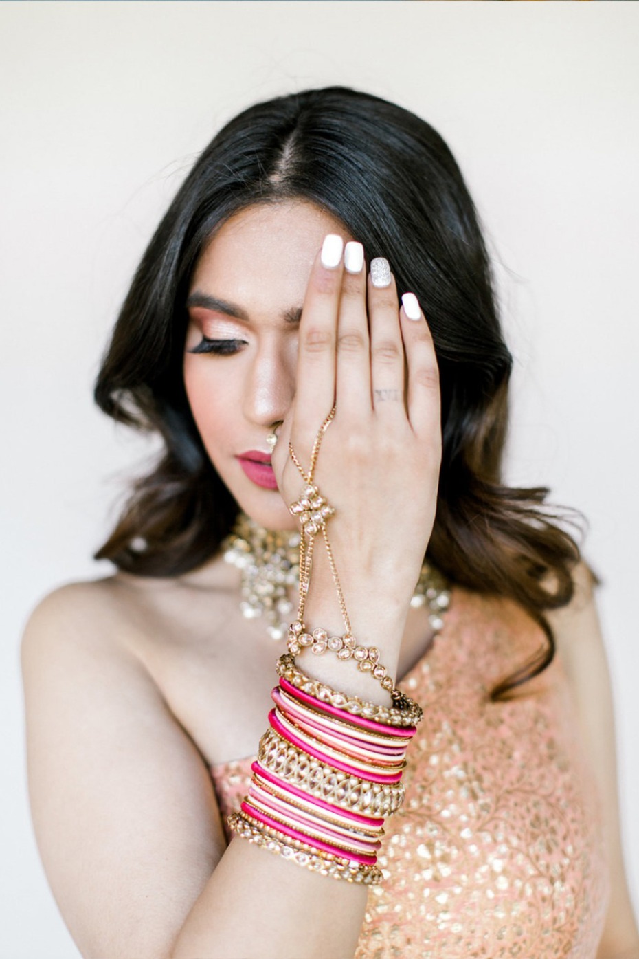 blush and raspberry traditional south asian wedding look