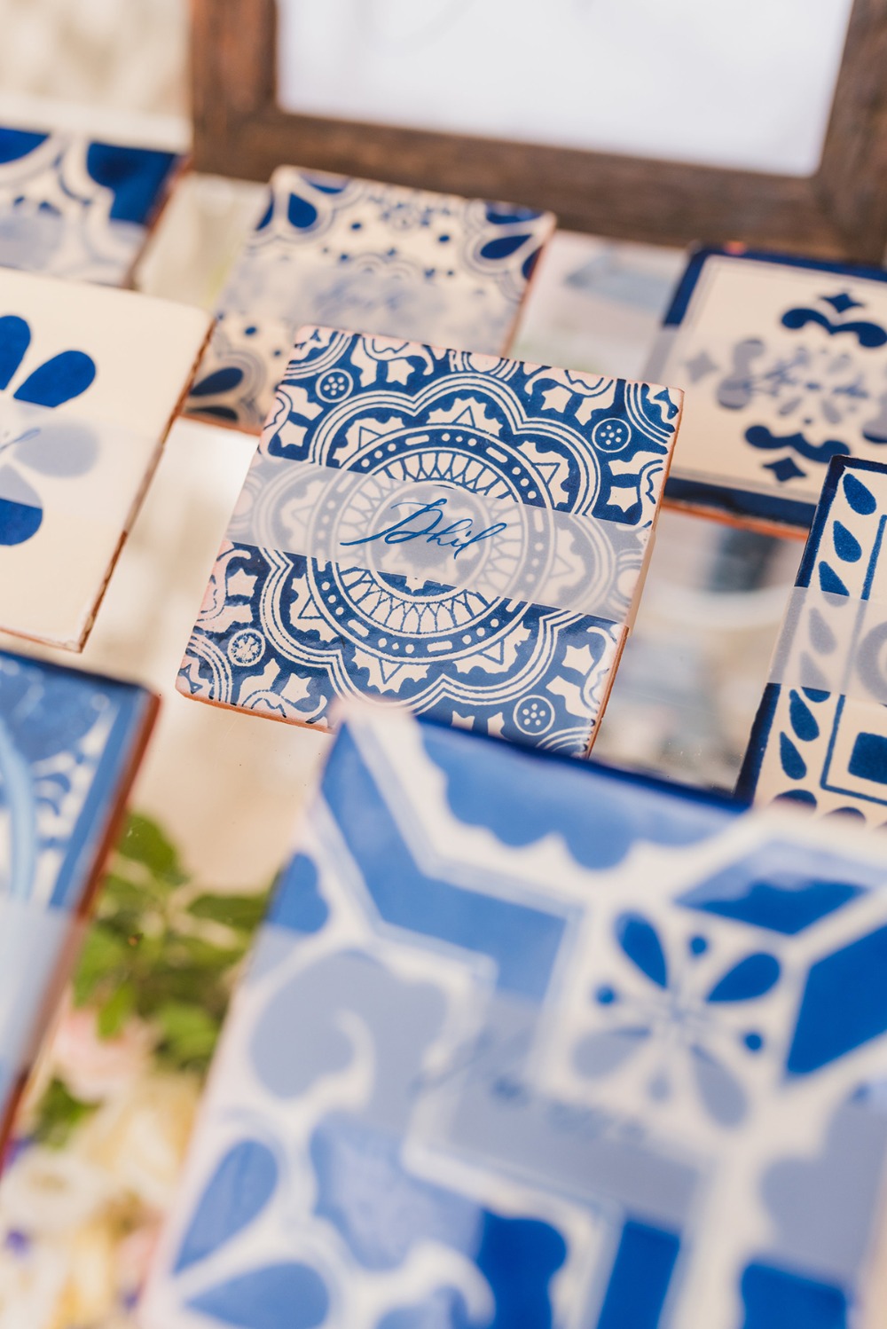 painted blue and white tile place cards