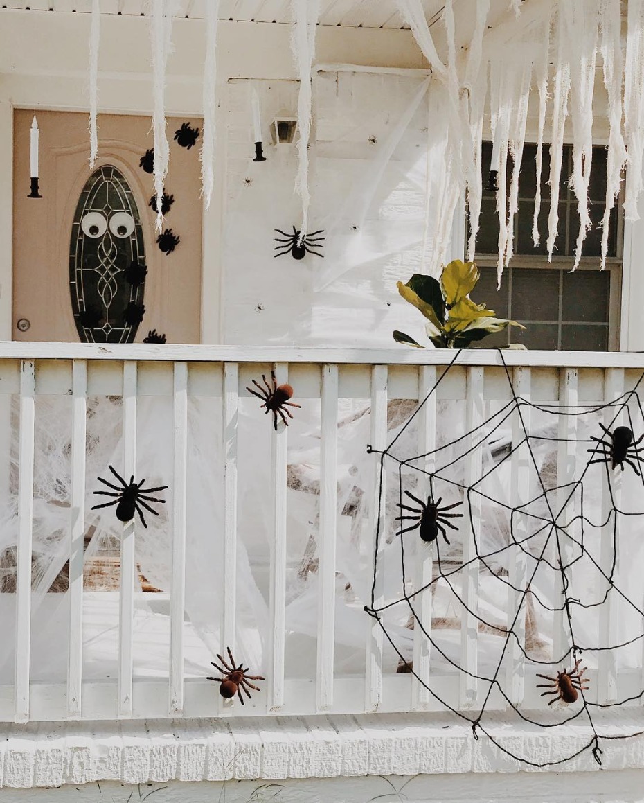 Autumn porch decorated with spiders