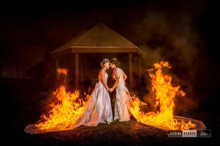 brides-torching-their-wedding-dresses-at-ceremony