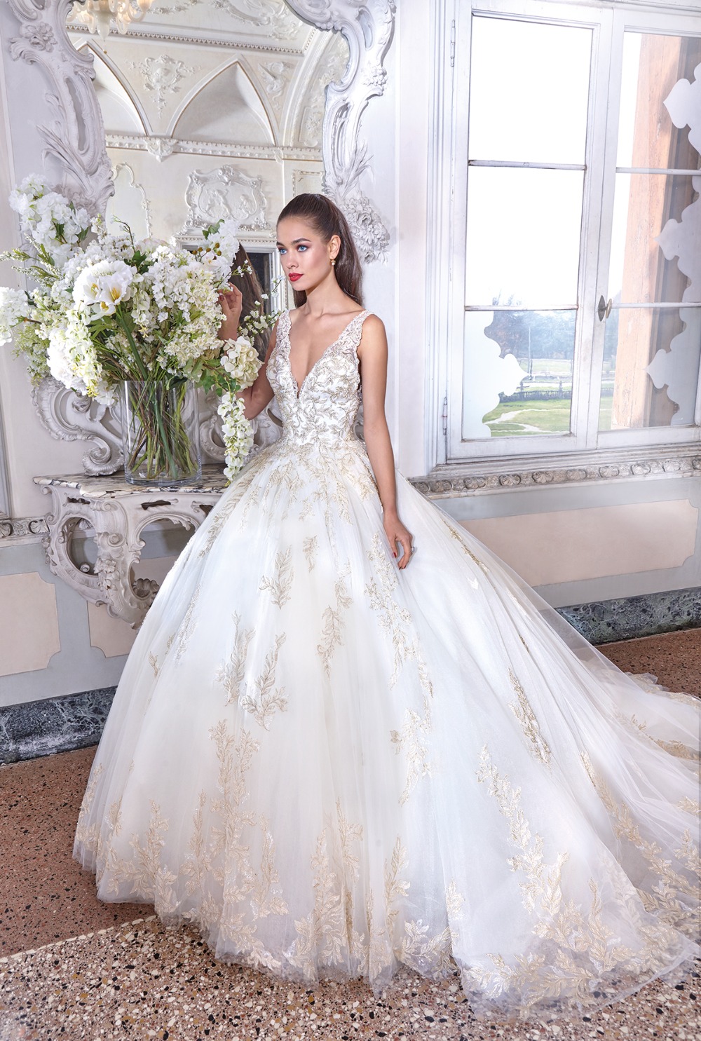 gold and tulle princess gown by Demetrios Platinum 19