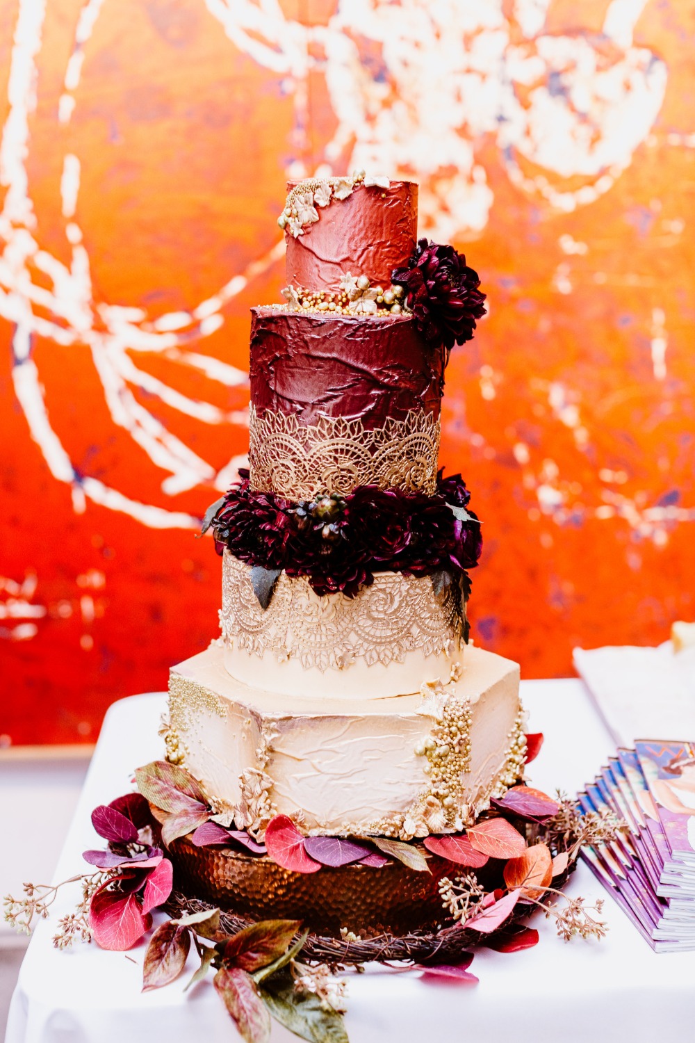 impressive burgundy and gold Moroccan inspired wedding cake