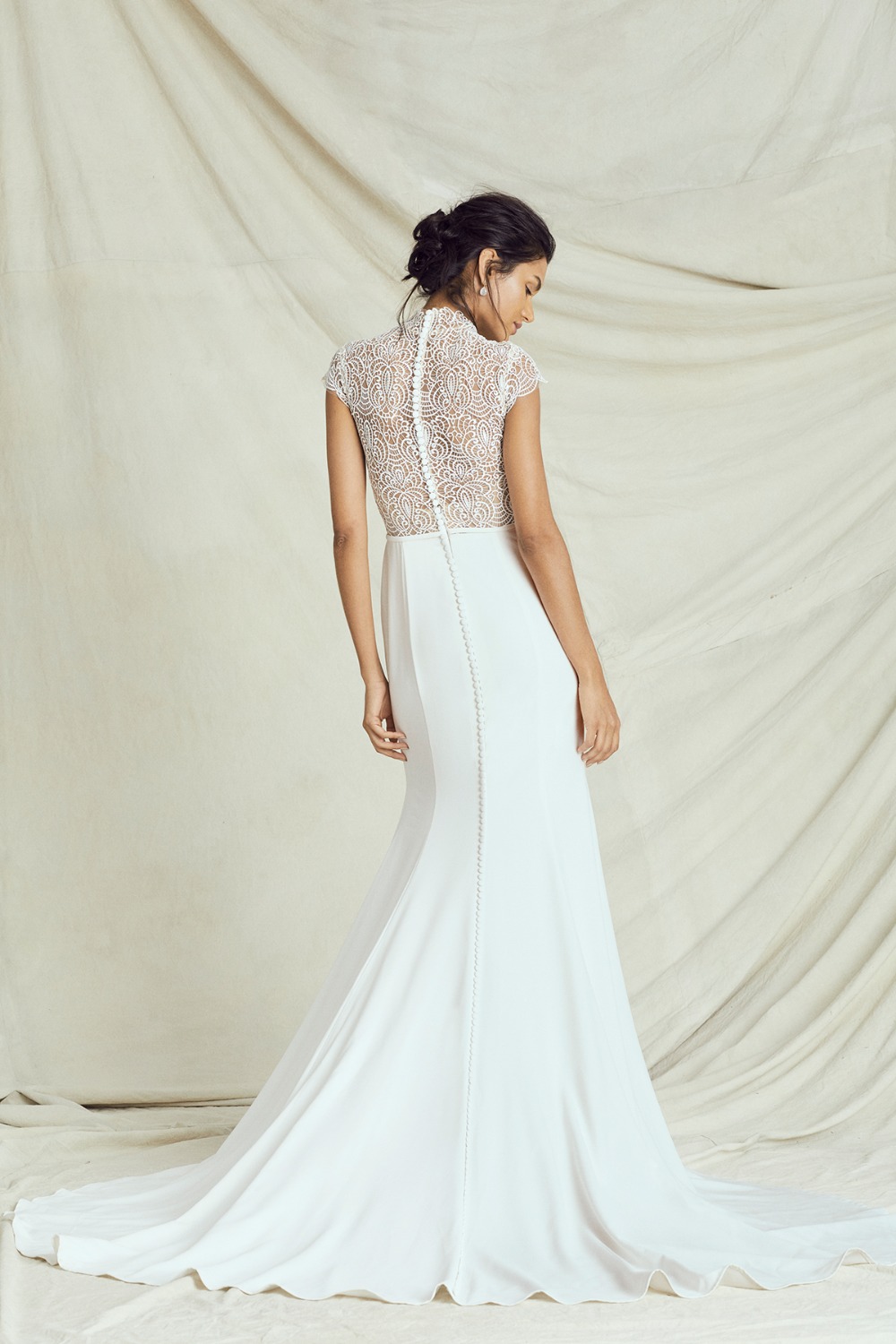 elegant laser cut top gown by Kelly Faetanini