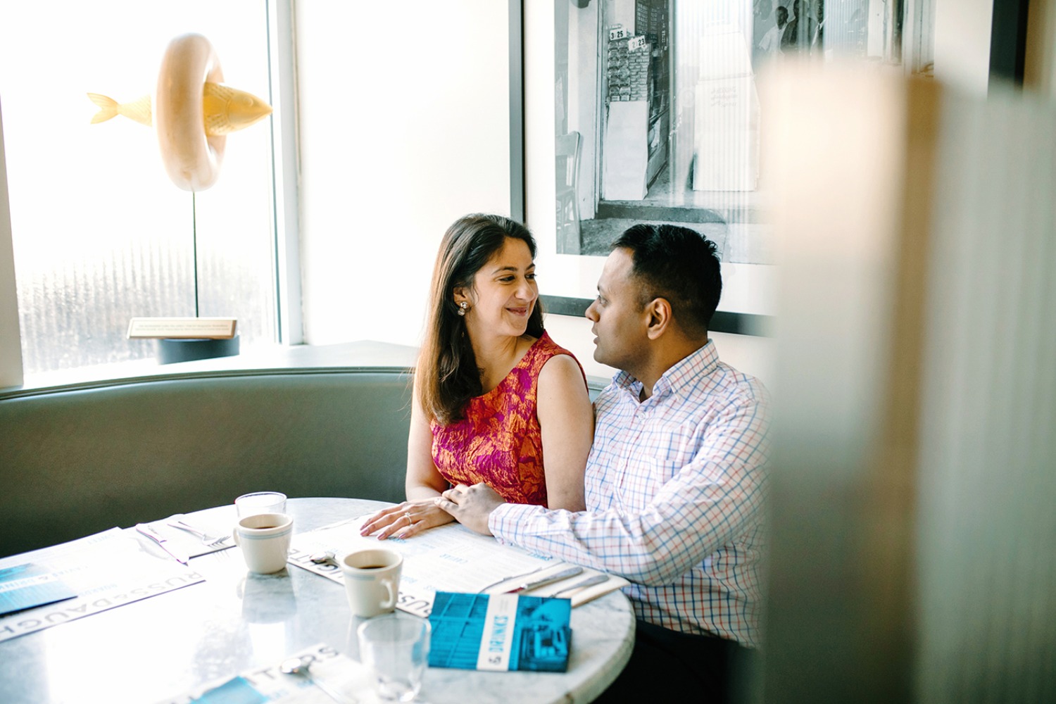 Couple on a date in a restaurant, enjoying conversation and coffee