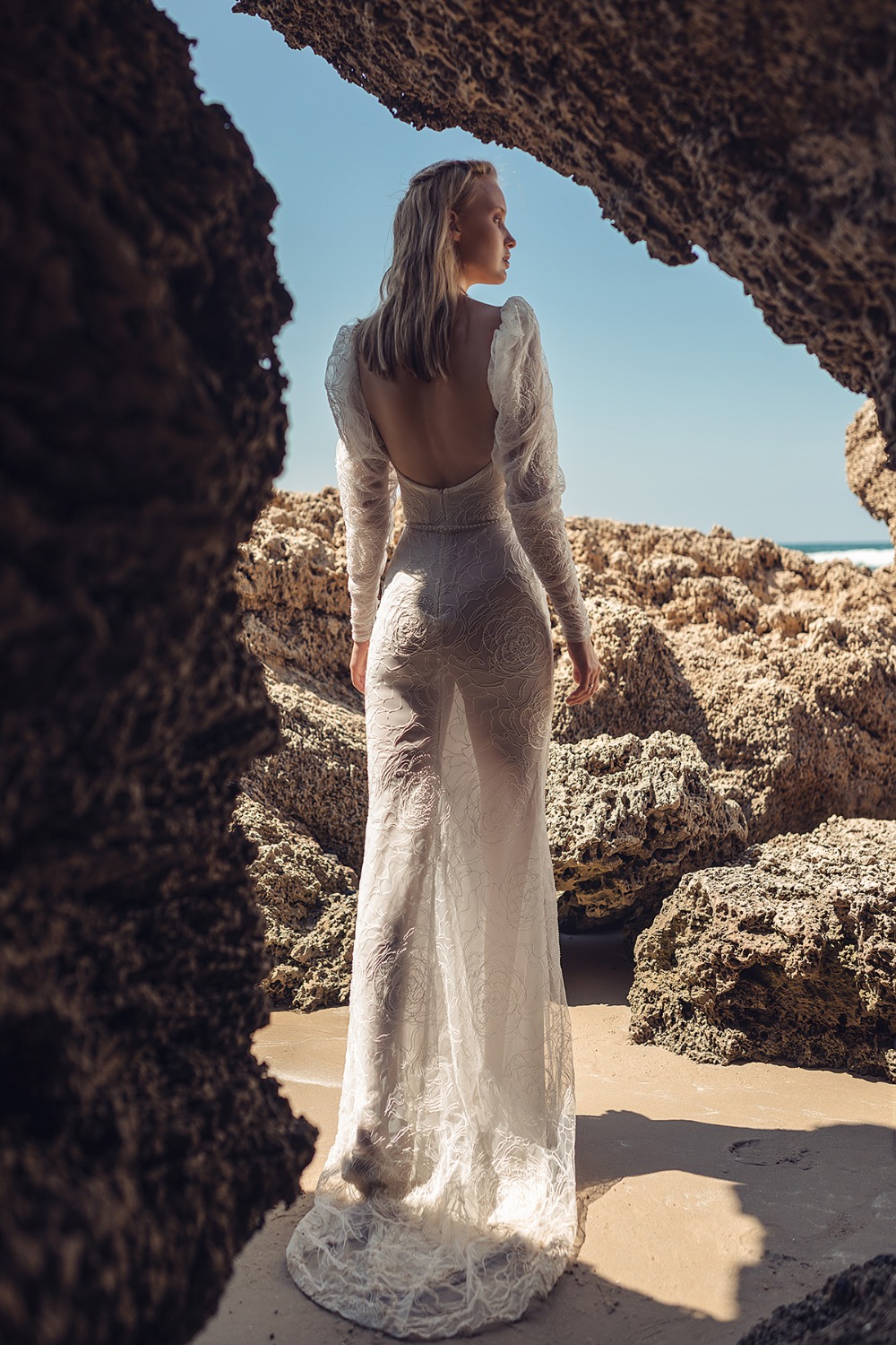 backless gown with dramatic puffed sleeves by Lilium