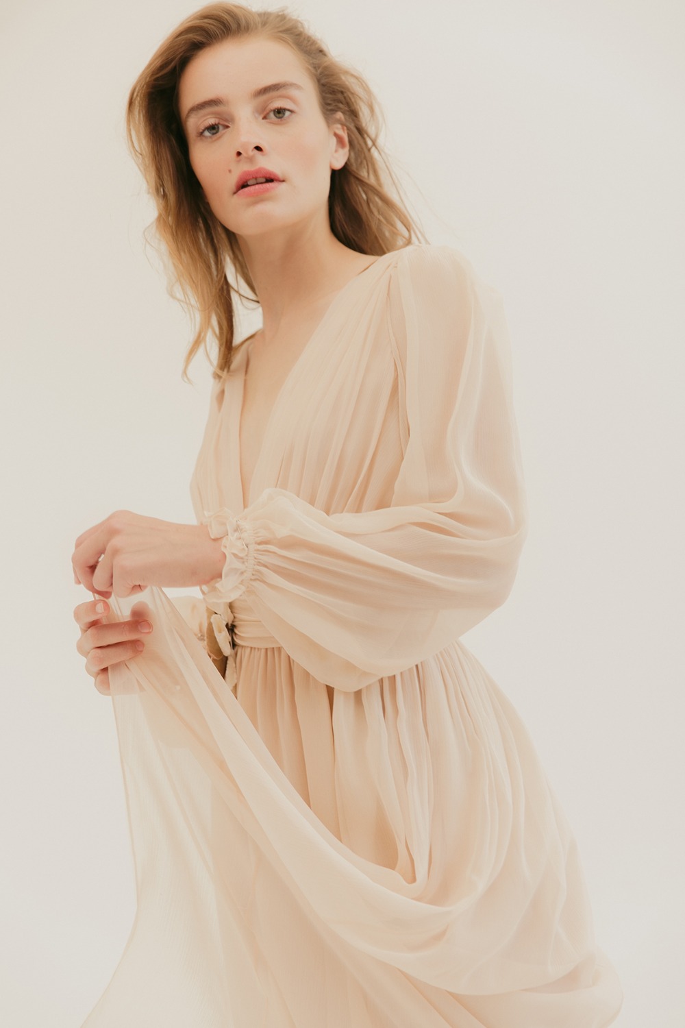 soft and flowing long sleeve dress by L. Wells