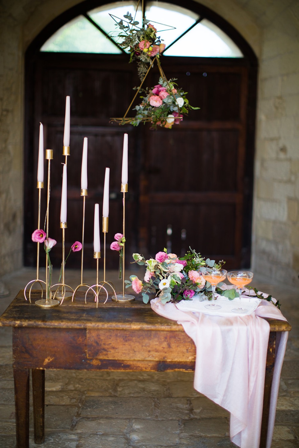 romantic floral and candle stick table decor