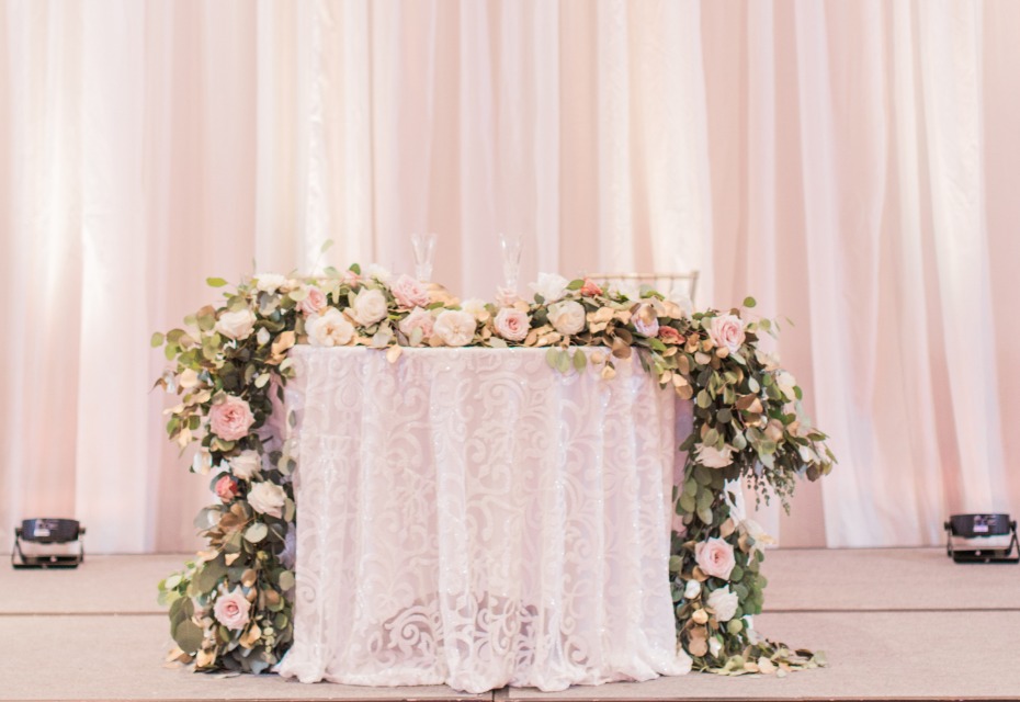 Floral garland sweetheart table decor