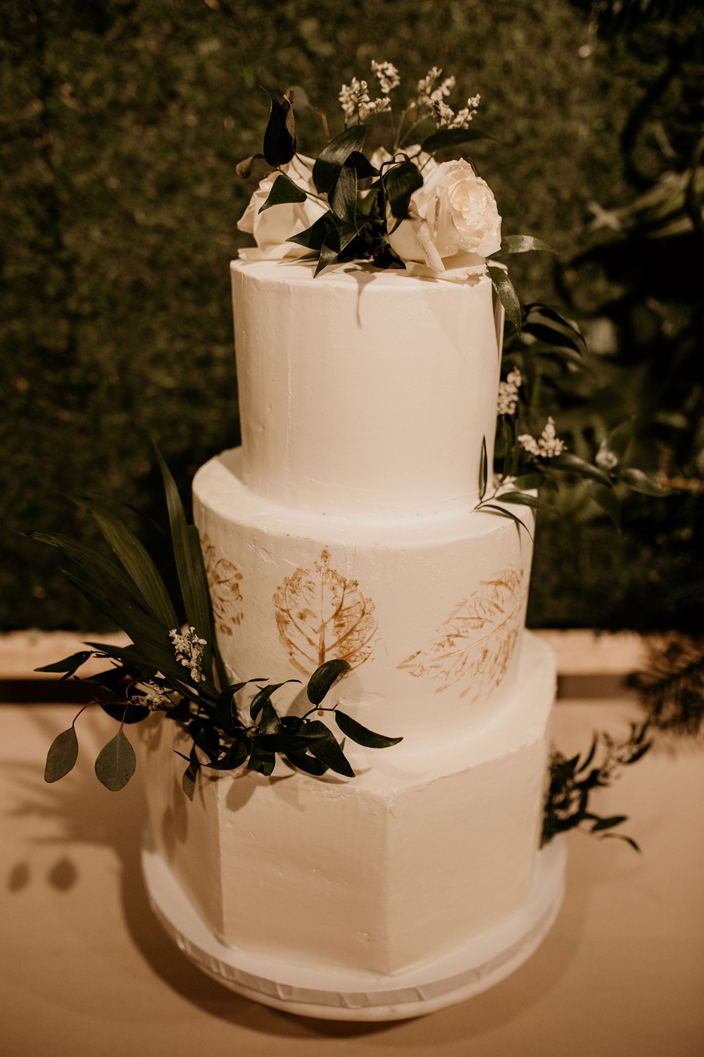romantic white and gold wedding cake