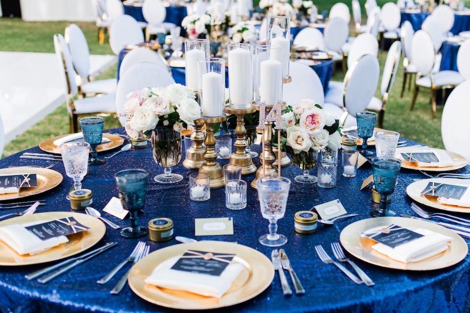 Elegant outdoor wedding table decor blue and gold
