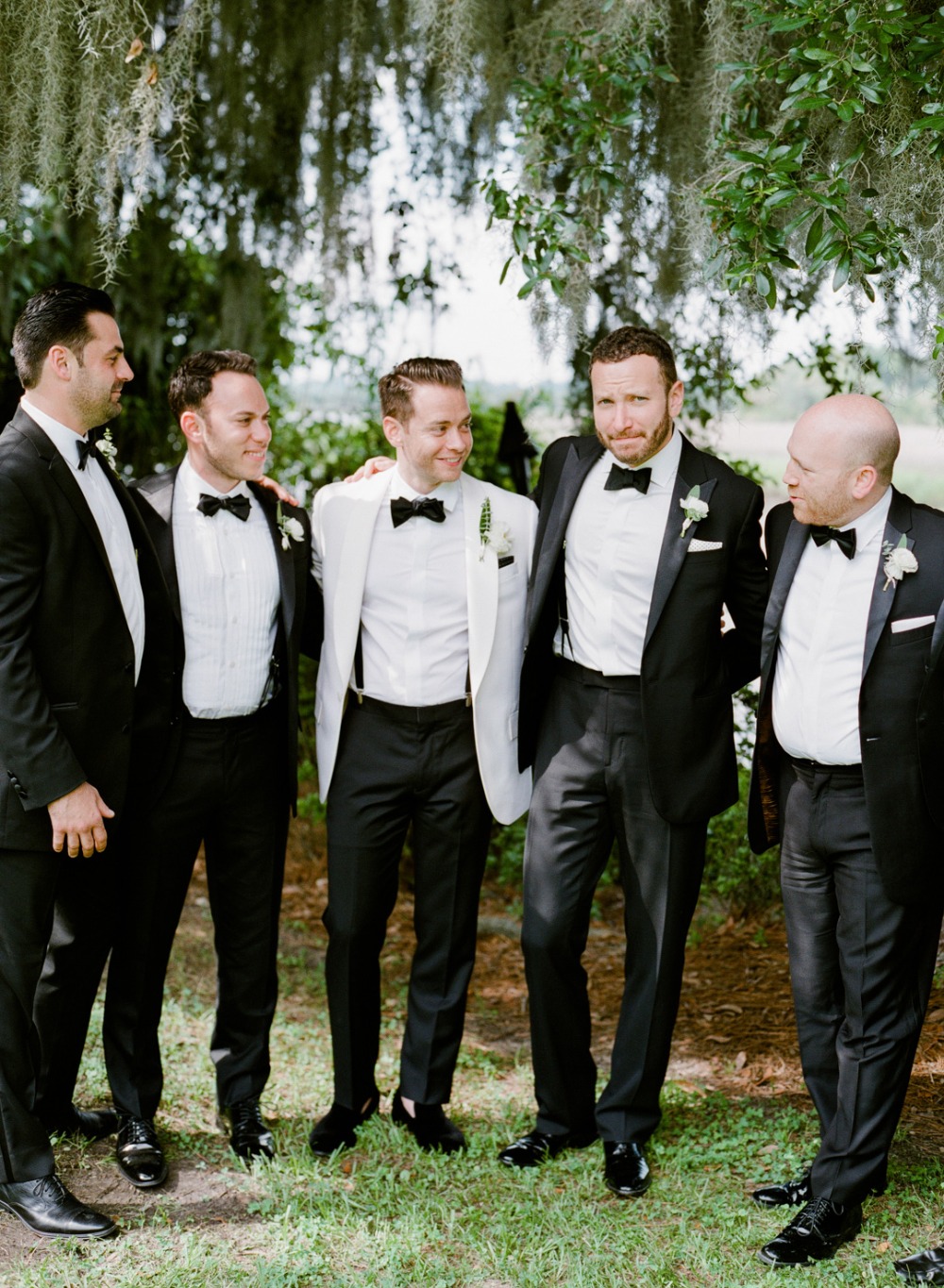formal groom and his men