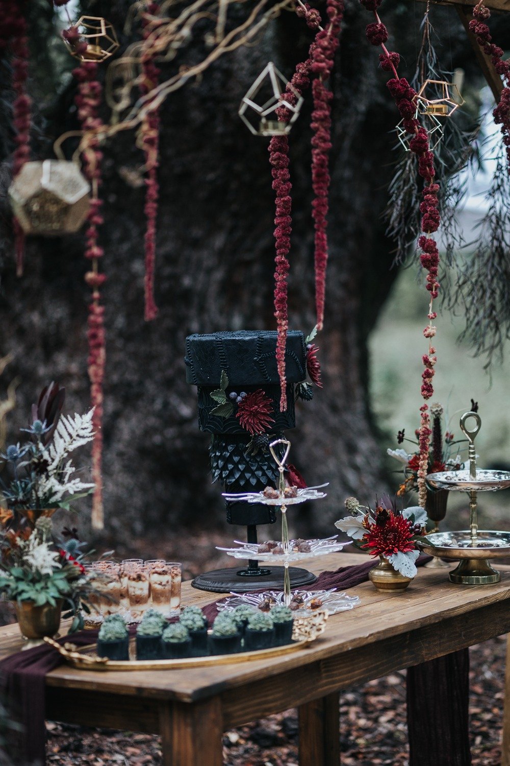 dark romance wedding dessert table