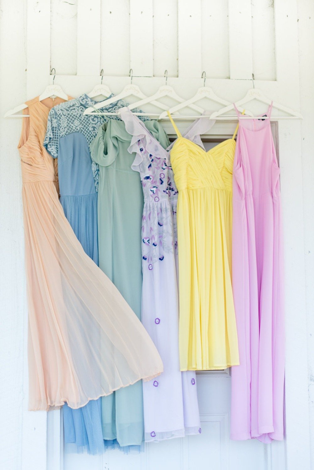 a rainbow of color bridesmaid dresses